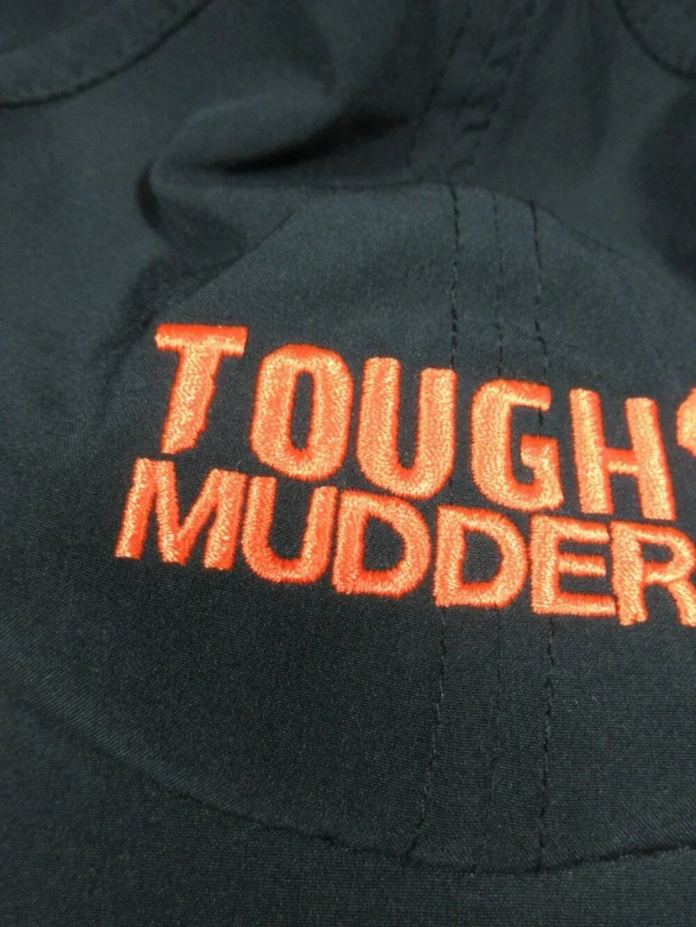 Under Armour mens charcoal an orange Tough Mudder running strapback hat OS EUC